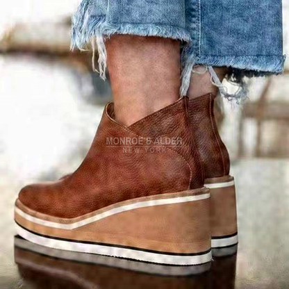 Nina ankle boots in brown, worn with cropped jeans