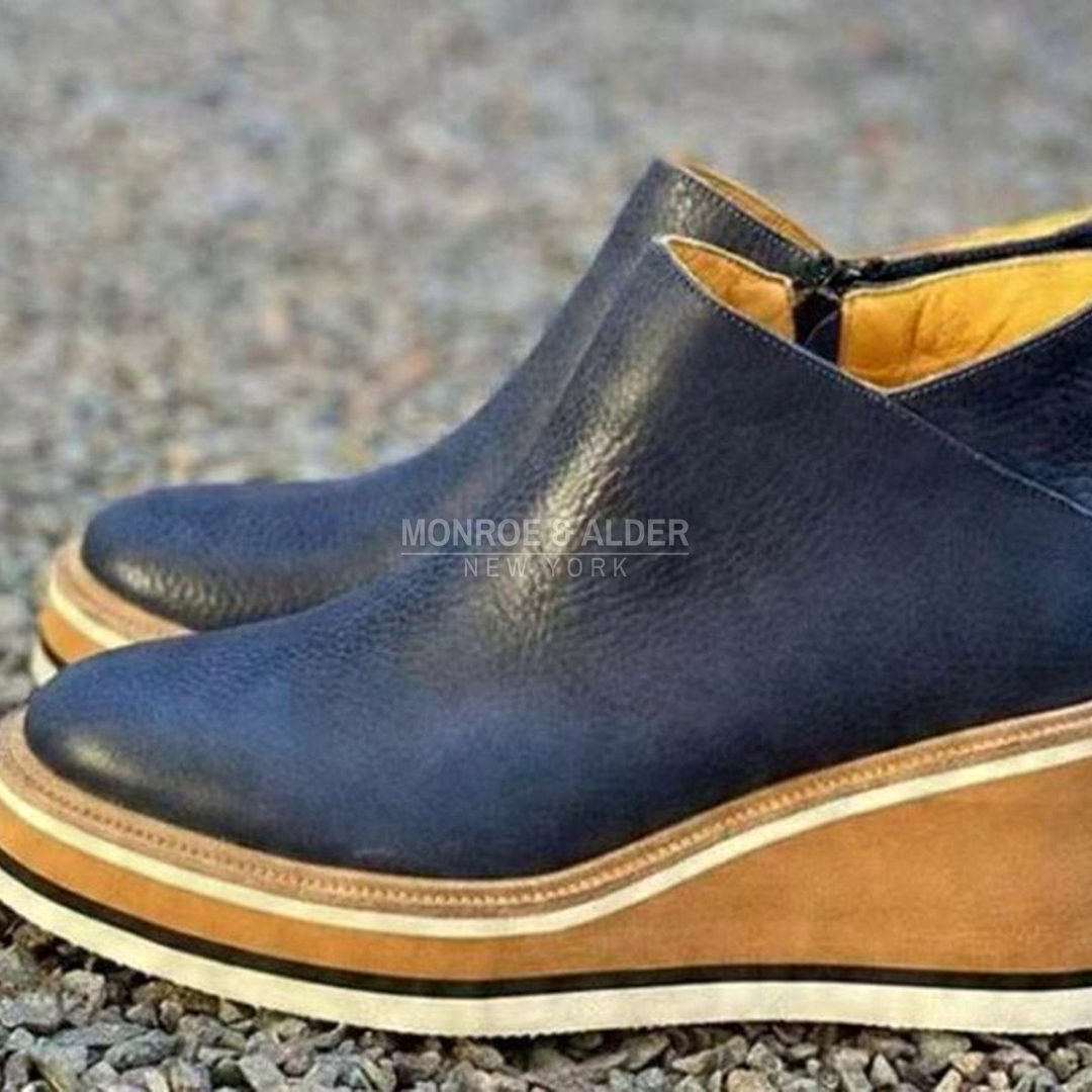 Nina ankle boots in navy, close view of the wide rounded toe