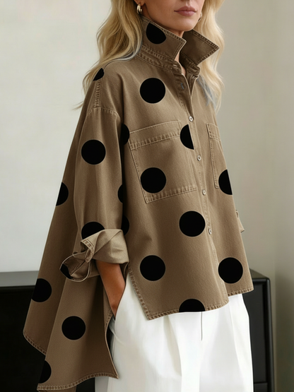 Tan polka dot overshirt with black dots, showing the chest pockets and folded cuff