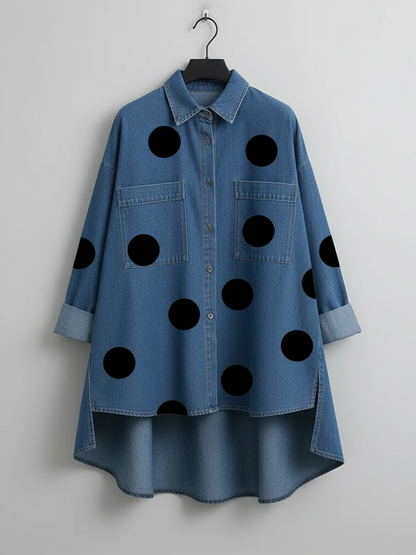 Blue polka dot overshirt shown flat on a hanger, with the shorter front and longer back clearly visible