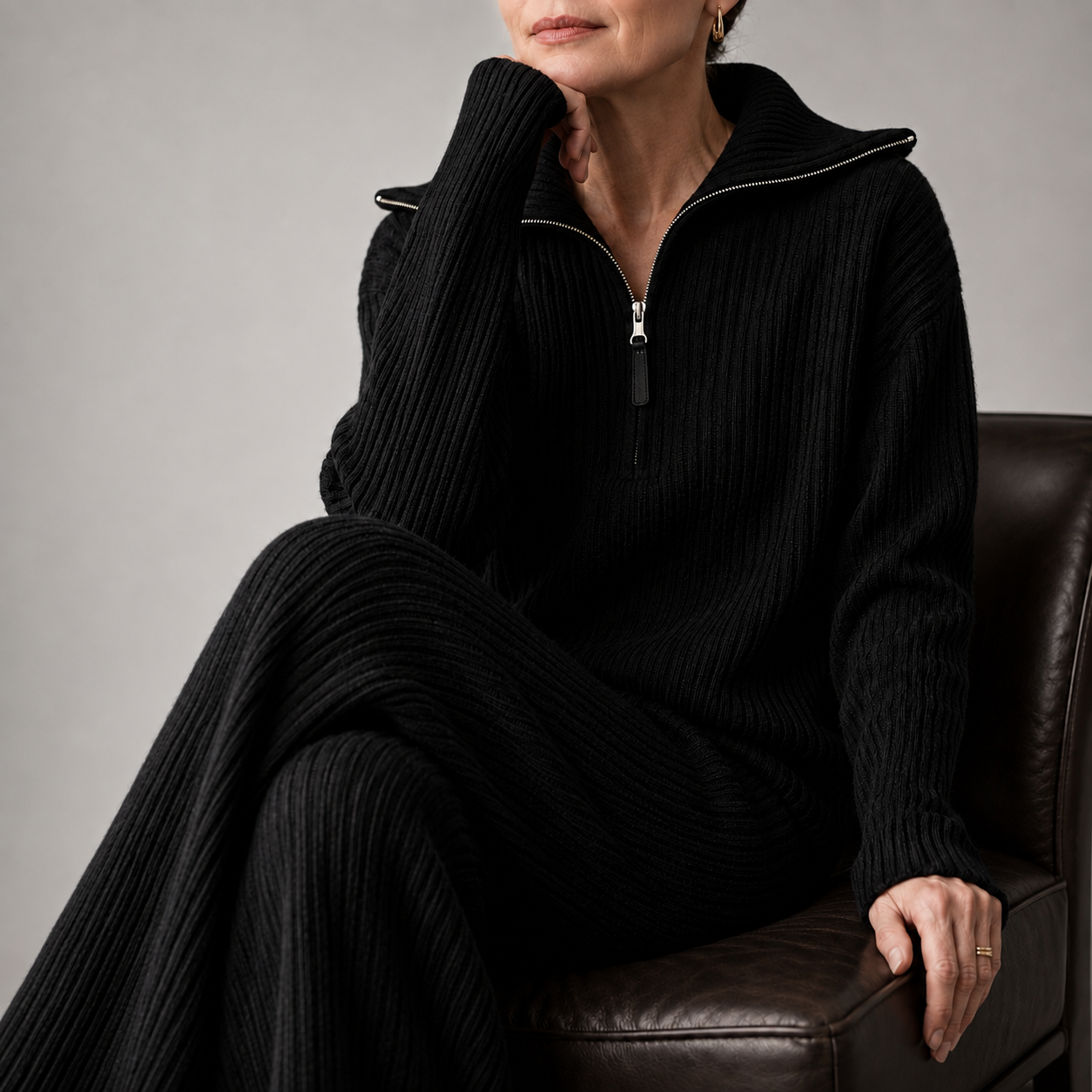 Rita ribbed knit lounge set in black, full look with the quarter zip pullover and wide-leg pants