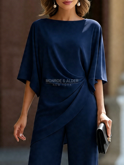 Close view of the draped waist in navy