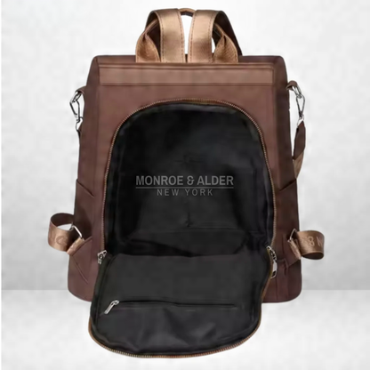 Rosanne bag in brown with the back panel unzipped, showing the main compartment