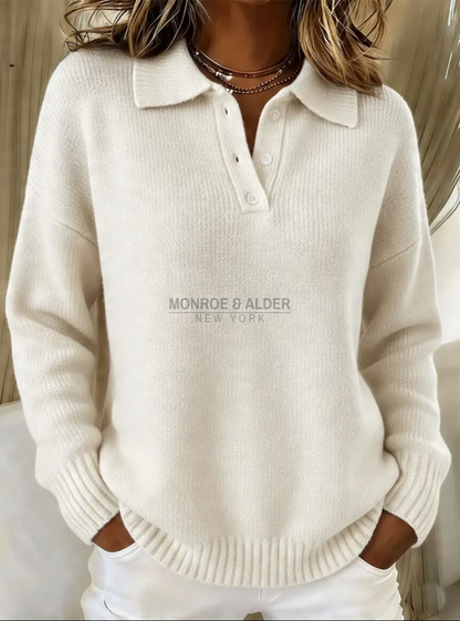 Sheila polo collar sweater in ivory, showing the button placket and ribbed hem