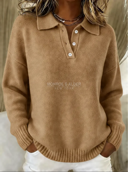 The ribbed cuff and dropped shoulder of the Sheila sweater in camel