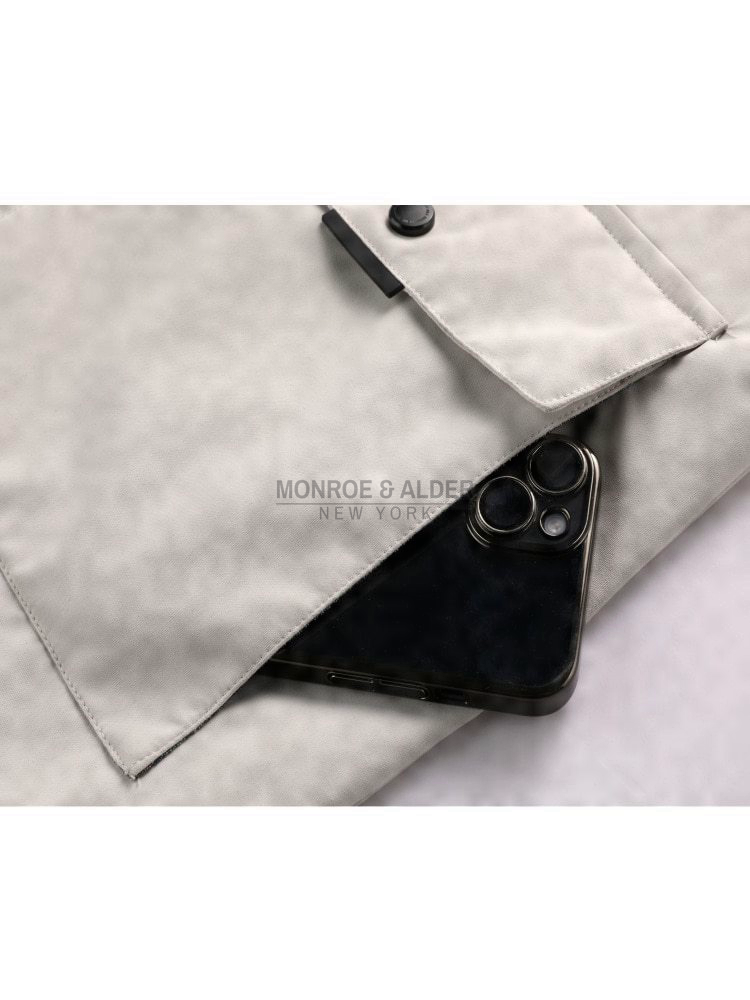 Zippered pocket holding a phone