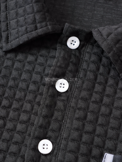Close view of the button placket and textured grid knit