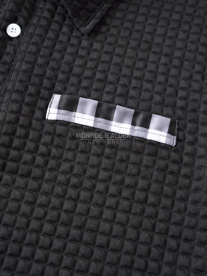 Close view of the plaid front pocket detail